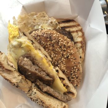 Cafe Lucia - Everything bagel, egg, cheese and sausage - Coffee & Tea Near Me - Atlanta, Georgia
