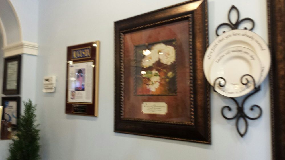 Honey from The Rock Cafe Logo