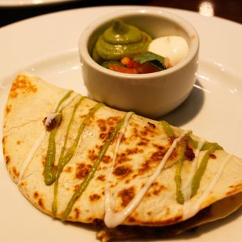 Carnival Cruise Lines - a quesadilla and a bowl of salsa - Resorts Near Me - New Orleans, Louisiana