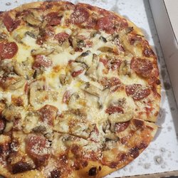 Tony & Maria's Italian Pizzeria - Thin crust Sausage, pepperoni, mushroom with light sauce.  Awesome!