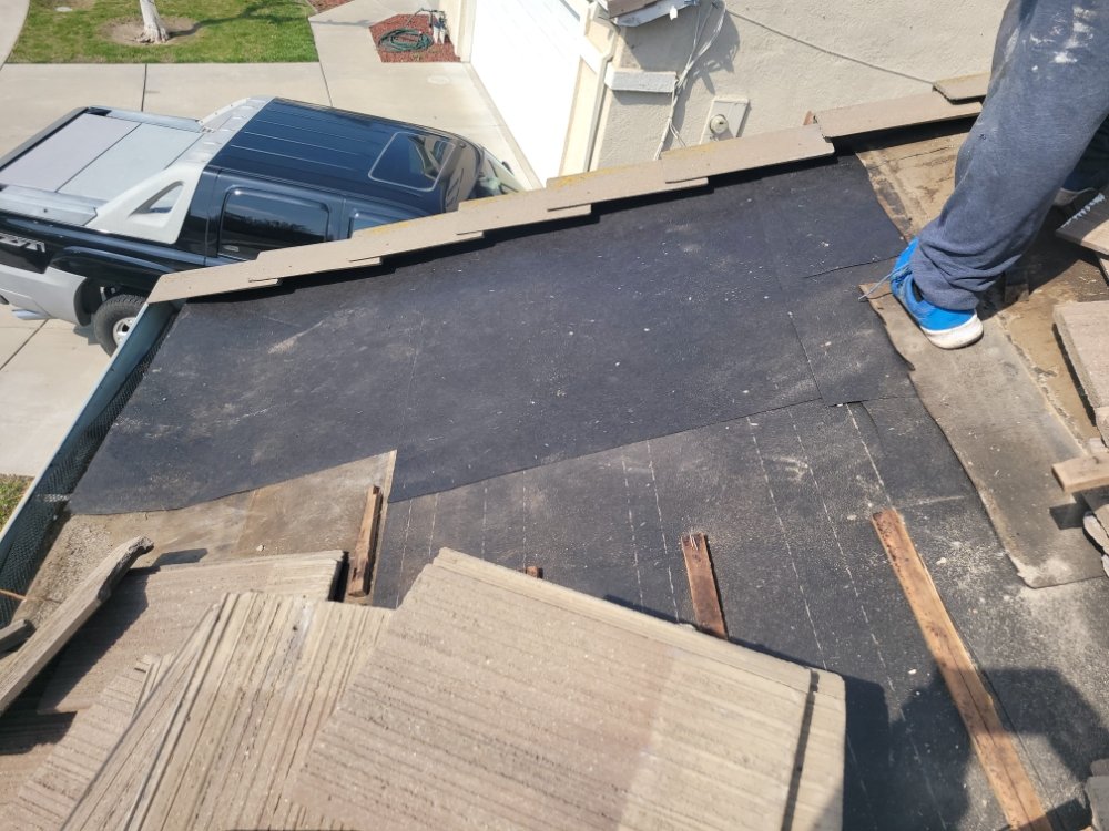 Slide of Franks Roof  Repairs