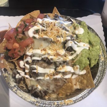 Lucha Libre - Champion 's Fries Or Nachos. These are the nachos with steak. - Mexican Near Me - San Diego, California Lucha Libre - Champion 's Fries Or Nachos. These are the nachos with steak. - Mexican Near Me - San Diego, California