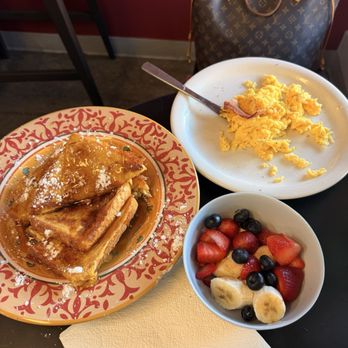 Yummy Plate - French toast comes with scrambled eggs & big bowl of fruit. We also had a yummy latte as well as the bacon & egg bagel. - Breakfast & Brunch Near Me - San Francisco, California Yummy Plate - French toast comes with scrambled eggs & big bowl of fruit. We also had a yummy latte as well as the bacon & egg bagel. - Breakfast & Brunch Near Me - San Francisco, California