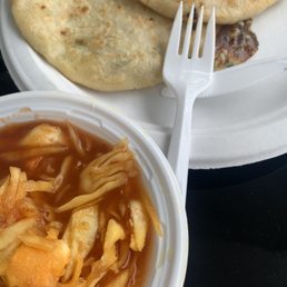 a bowl of soup and a plate of tortillas a bowl of soup and a plate of tortillas