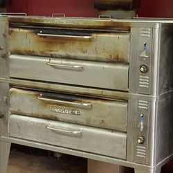 Ianazone's Homemade Pizza - They warm up pizza by the slice in a real pizza oven.