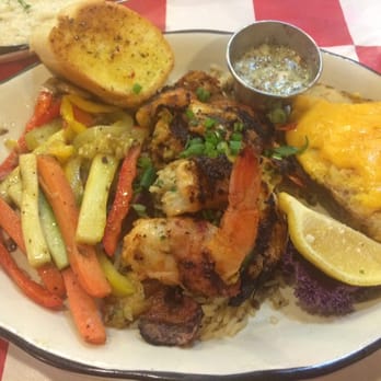 Happy's Fish House - Bacon wrapped shrimp with a loaded potato and veggies - Cajun/Creole Near Me - Tyler, Texas Happy's Fish House - Bacon wrapped shrimp with a loaded potato and veggies - Cajun/Creole Near Me - Tyler, Texas