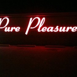 Pure Pleasure - Sign in front of Pure Pleasure