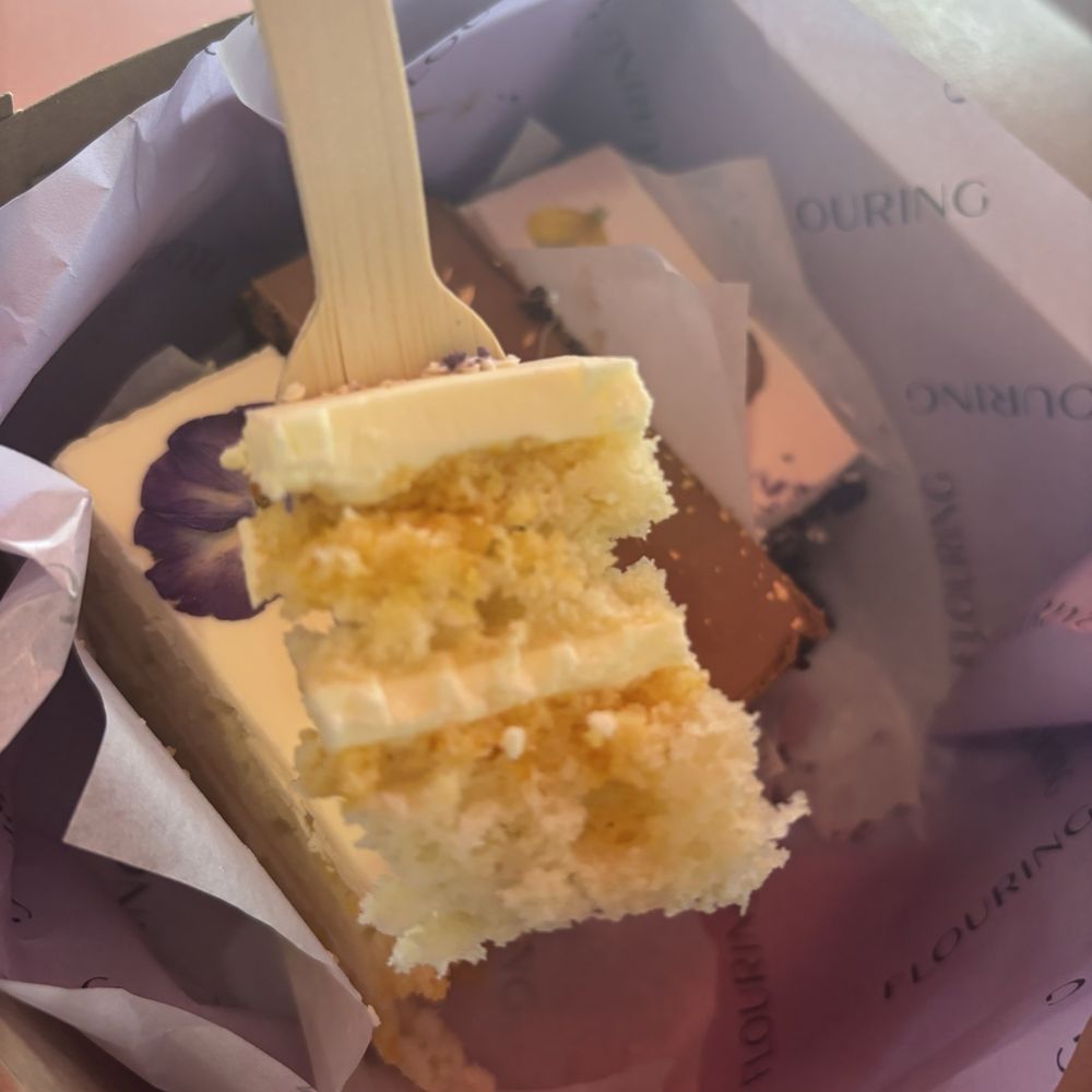 Flouring Cake Shop - Passionfruit | 1 pc. $7.95 Vanilla Cake brushed with Passion Fruit Puree, frosted with Passion Fruit infused Buttercream & w/ edible blooms. - Patisserie/Cake Shop Near Me - Los Angeles, California Flouring Cake Shop - Passionfruit | 1 pc. $7.95 Vanilla Cake brushed with Passion Fruit Puree, frosted with Passion Fruit infused Buttercream & w/ edible blooms. - Patisserie/Cake Shop Near Me - Los Angeles, California