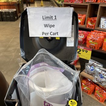 Kroger - a bin with a plastic lid and a sign that reads limit 1 wipe per cart - Grocery Near Me - Snellville, Georgia