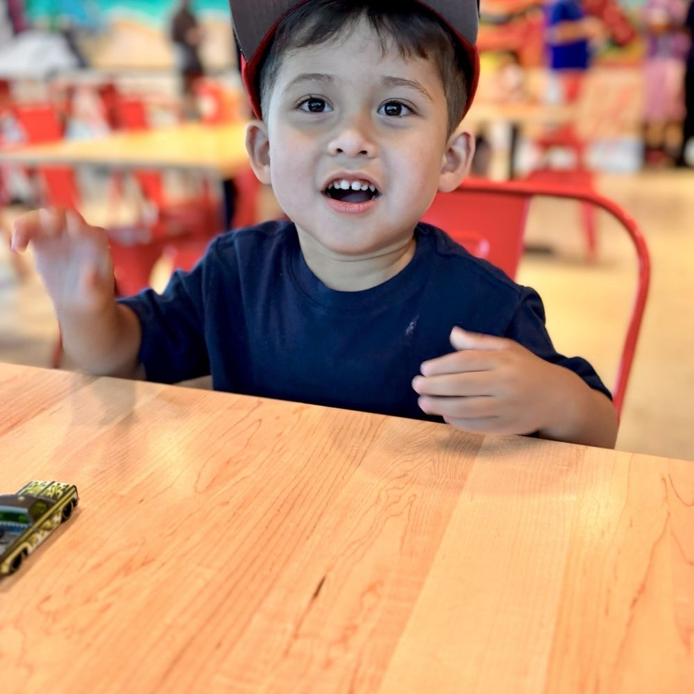 Dave's Hot Chicken - My son happy with French Fries - Chicken Shop Near Me - Boynton Beach, Florida