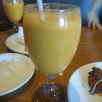 Indian Haweli - mango lassi. It was filled to the top, but I super wanted it and took a giant gulp before pic was taken. - Indian Near Me - Simi Valley, California