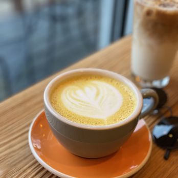 Ugly Mug Cafe & Coffee Roasters - Interbay - Turmeric Latte with amazing cardamom notes. So good! - Coffee & Tea Near Me - Seattle, Washington Ugly Mug Cafe & Coffee Roasters - Interbay - Turmeric Latte with amazing cardamom notes. So good! - Coffee & Tea Near Me - Seattle, Washington