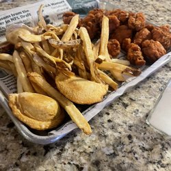 Shelly's Uptown Grill - 1lbs boneless wings, basket of fries with pirogies. Excellent choice for shared share