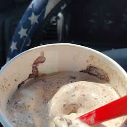 A melted dairy queen blizzard