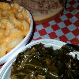Pulled pork sandwich platter with greens and mac & cheese - $8.99