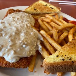 Diner 39 - Country Fried chicken topped with sausage gravy, fries & garlic toast