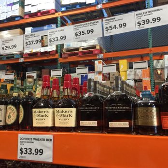 KH&H Liquors - bottles of liquor on shelves - Beer, Wine & Spirits Near Me - Astoria, New York