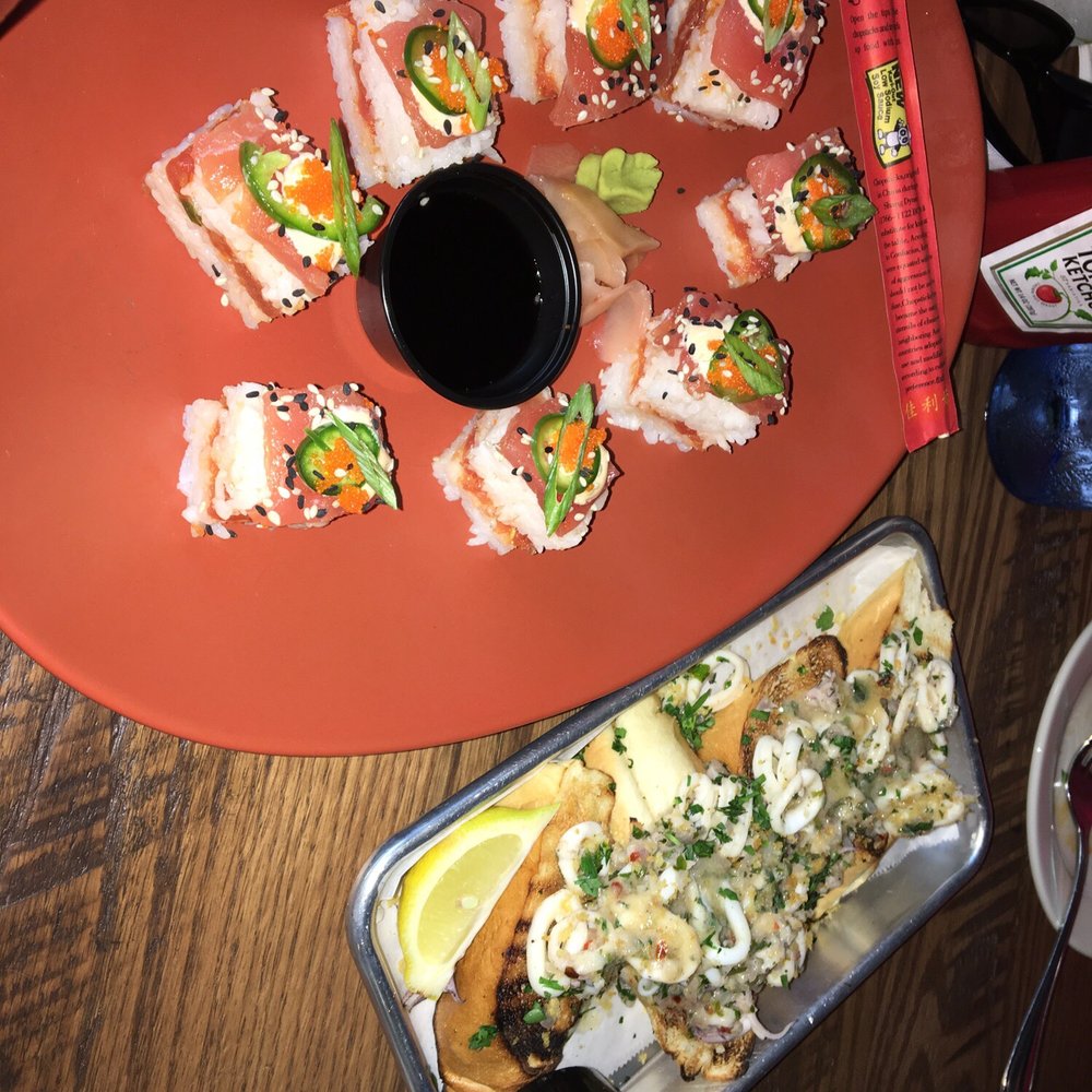 Squid Ink Eclectic Eats & Drinks - Pressed spicy tuna sushi and Spanish S.O.S. (Squid on a shingle) - Gastropubs Near Me - Mobile, Alabama Squid Ink Eclectic Eats & Drinks - Pressed spicy tuna sushi and Spanish S.O.S. (Squid on a shingle) - Gastropubs Near Me - Mobile, Alabama
