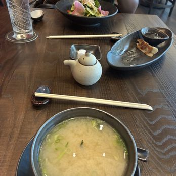 Azumi - Starters Miso soup , wontons with soy sauce and a small salad - Sushi Bars Near Me - Houston, Texas