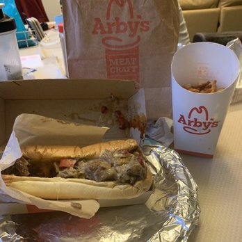 Arby's - a sandwich and a drink on a table - Sandwiches Near Me - Beaverton, Oregon