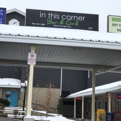 In This Corner Bar & Grill - Front entrance- walk to the end of the row of stores on your right
