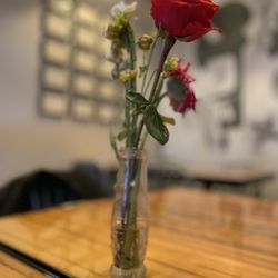 Nighthawk's Kitchen - Dining area with fresh flowers. I love that!
