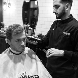 Jonny The Barber - Jon cutting hair.