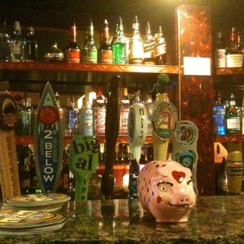 Pub at Piper's Creek - a piggy bank on the bar - Pubs Near Me - Seattle, Washington Pub at Piper's Creek - a piggy bank on the bar - Pubs Near Me - Seattle, Washington