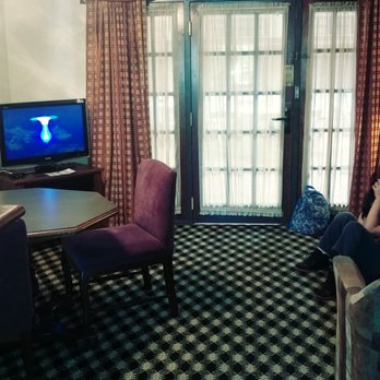 MCM Elegante Suites - Front doors, looking out to ballroom and 2nd tv in living room. - Hotels Near Me - Abilene, Texas MCM Elegante Suites - Front doors, looking out to ballroom and 2nd tv in living room. - Hotels Near Me - Abilene, Texas
