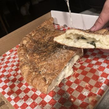 Detroit Pizza - Battle Ground - Creamy garlic with chicken and spinach calzone - Pizza Near Me - Battle Ground, Washington Detroit Pizza - Battle Ground - Creamy garlic with chicken and spinach calzone - Pizza Near Me - Battle Ground, Washington