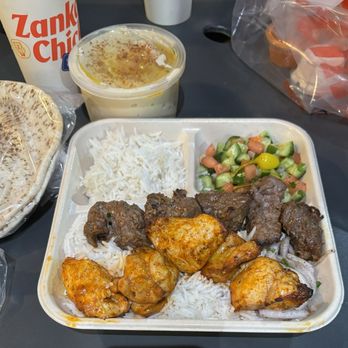 Zankou Chicken - Combo Kabob Plate with Shish Kabob Skewer and Chicken Kabob Skewer. Rice and Cucumber Salad with Large Hummus and Pita Bread - Mediterranean Near Me - Long Beach, California Zankou Chicken - Combo Kabob Plate with Shish Kabob Skewer and Chicken Kabob Skewer. Rice and Cucumber Salad with Large Hummus and Pita Bread - Mediterranean Near Me - Long Beach, California