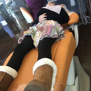 World Pediatric Dental - She gets to watch a movie on the ceiling while being seen - Pediatric Dentists Near Me - San Antonio, Texas