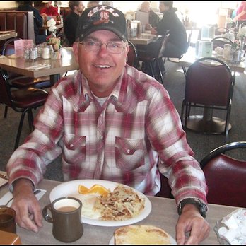 Nicely's - Ariana was happy to snap my photo.  Notice the vast array of Tabasco sauce, including chipotle, with is something that I crave. - American Near Me - Lee Vining, California
