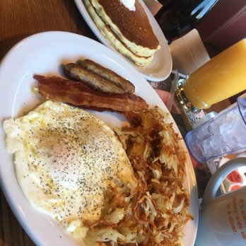 Denny's - Slugger with eggs over medium, pancakes, coffee and orange juice included. Best Dennys deal! - Diners Near Me - Bangor, Maine