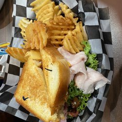 Clovis Point Bar and Grill - Club sandwich with waffle fries