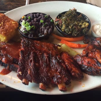 Dinosaur Bar-B-Que - Pick three: Saint Louis style ribs, chicken wings and brisket with turkey neck collard greens and black beans and rice - Barbeque Near Me - Syracuse, New York
