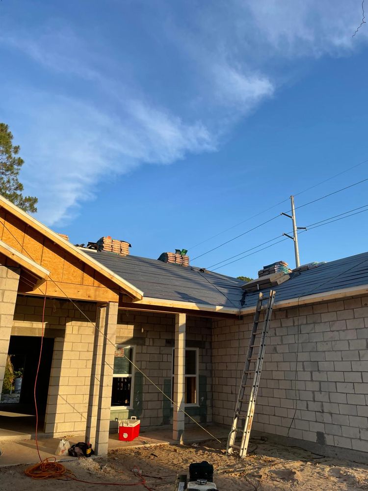 Slide of Osmin Roofing