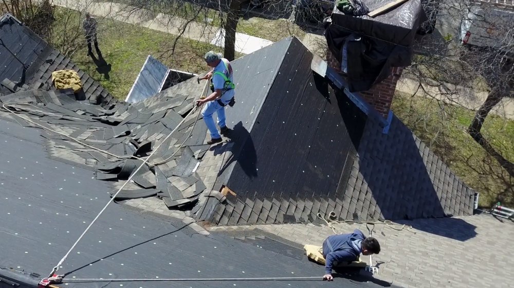 Slide of 911 Exteriors Roofing & Fence