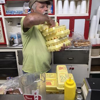 Texas Tavern - One of the employees bringing in the eggs. - Burgers Near Me - Roanoke, Virginia