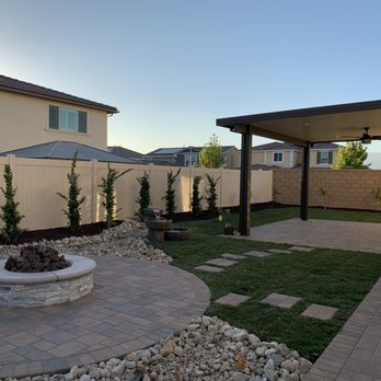 Rafael's Landscape - a backyard with a fire pit - Landscaping Near Me - Rialto, California