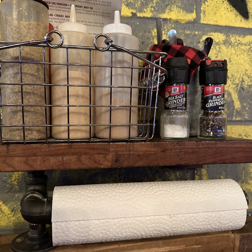 Würst Bier Hall - Condiments, silverware and paper towels at each table. - German Near Me - Fargo, North Dakota Würst Bier Hall - Condiments, silverware and paper towels at each table. - German Near Me - Fargo, North Dakota