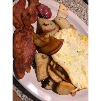 Sunrise Cafe - Nom nom nom!  2 over hard eggs, sunrise potatoes, nitrate free/incited bacon. - New American Near Me - Yellow Springs, Ohio
