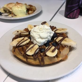 Bogart's Cafe - Nutella waffles cancel the strawberries and blueberries and bananas added - Breakfast & Brunch Near Me - Honolulu, Hawaii Bogart's Cafe - Nutella waffles cancel the strawberries and blueberries and bananas added - Breakfast & Brunch Near Me - Honolulu, Hawaii