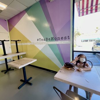 Tea Be Honest - a table with two donuts on it - Bubble Tea Near Me - Cathedral City, California Tea Be Honest - a table with two donuts on it - Bubble Tea Near Me - Cathedral City, California