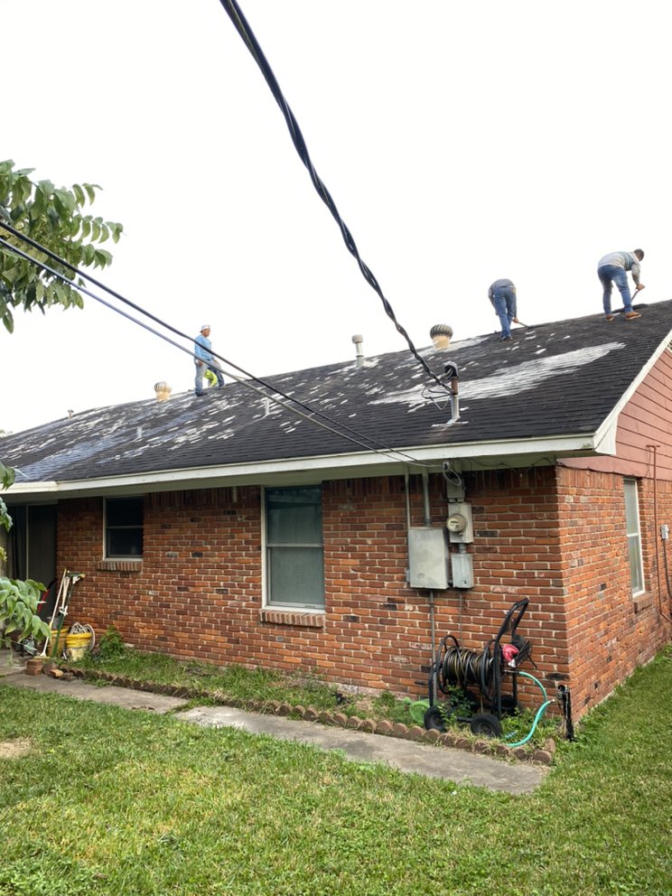 Slide of Quality King Roofing