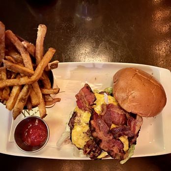Wilde Bar & Restaurant - Classic Burger with American cheese and bacon - Pubs Near Me - Chicago, Illinois Wilde Bar & Restaurant - Classic Burger with American cheese and bacon - Pubs Near Me - Chicago, Illinois