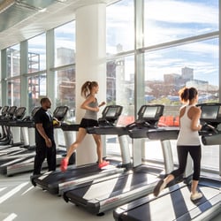 Mercedes Club - Treadmills facing the outdoor pool deck