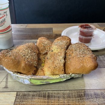 Mancino's Pizza & Grinders - Calzone is big enough to satisfy two hungry shoppers . . . - Pizza Near Me - Owosso, Michigan Mancino's Pizza & Grinders - Calzone is big enough to satisfy two hungry shoppers . . . - Pizza Near Me - Owosso, Michigan