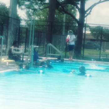 Driftwood Community Pool - Oh look, I found the lifeguards.  All huddled in one corner of the pool while the kids do their own thing. - Swimming Pools Near Me - Hollywood, Florida