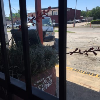 Harvey B's - View from my bar stool. Note the left lower corner... An old Cola machine turned planter!!! Digging it - Burgers Near Me - Dallas, Texas Harvey B's - View from my bar stool. Note the left lower corner... An old Cola machine turned planter!!! Digging it - Burgers Near Me - Dallas, Texas